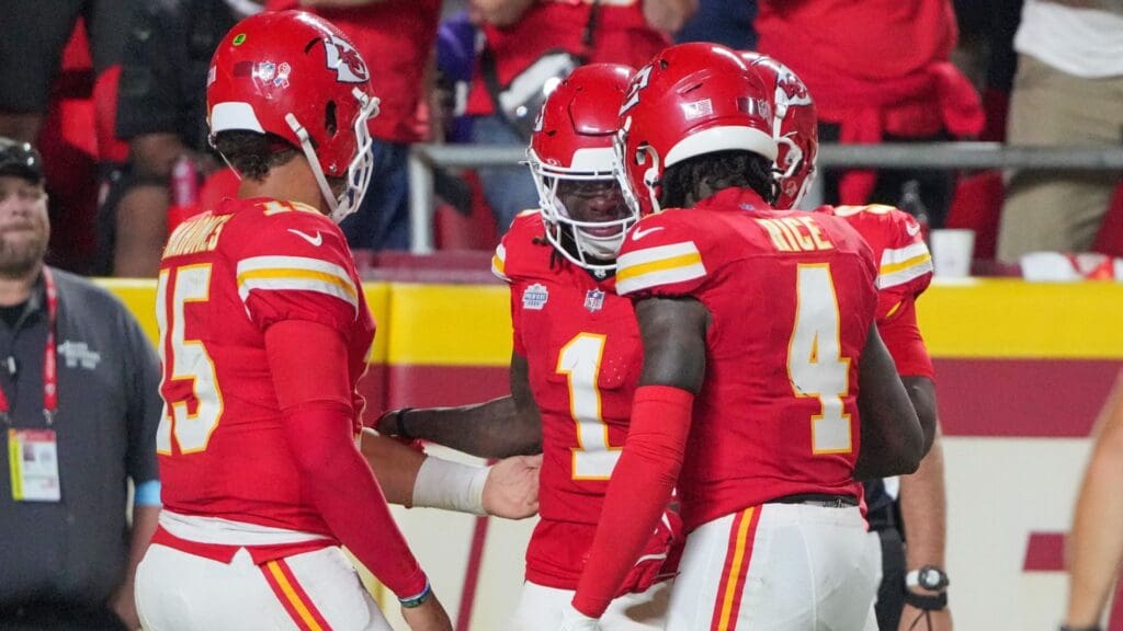 Sep 5, 2024; Kansas City, Missouri, USA; Kansas City Chiefs wide receiver Xavier Worthy (1) celebrates with quarterback Patrick Mahomes (15) and wide receiver Rashee Rice (4) after scoring a touchdown against the Baltimore Ravens during the game at GEHA Field at Arrowhead Stadium.