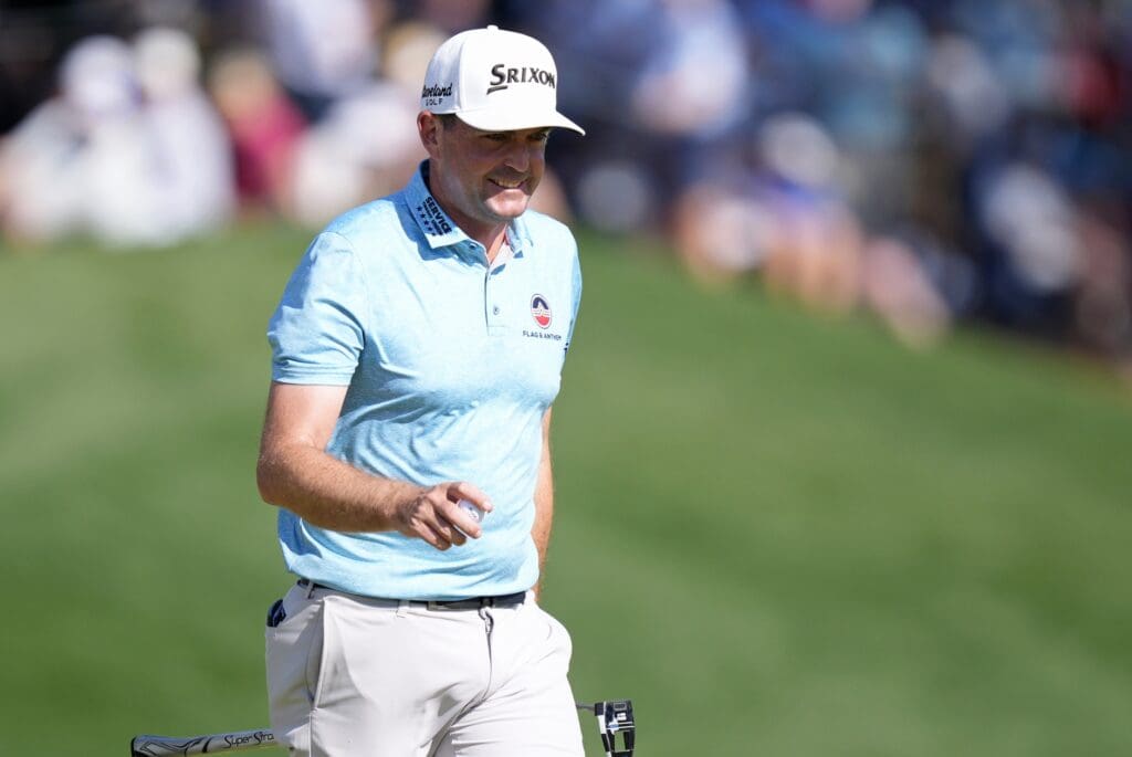 May 17, 2025; Charlotte, North Carolina, USA; Keegan Bradley reacts after a putt on the 18th green during the third round of the PGA Championship golf tournament at Quail Hollow.