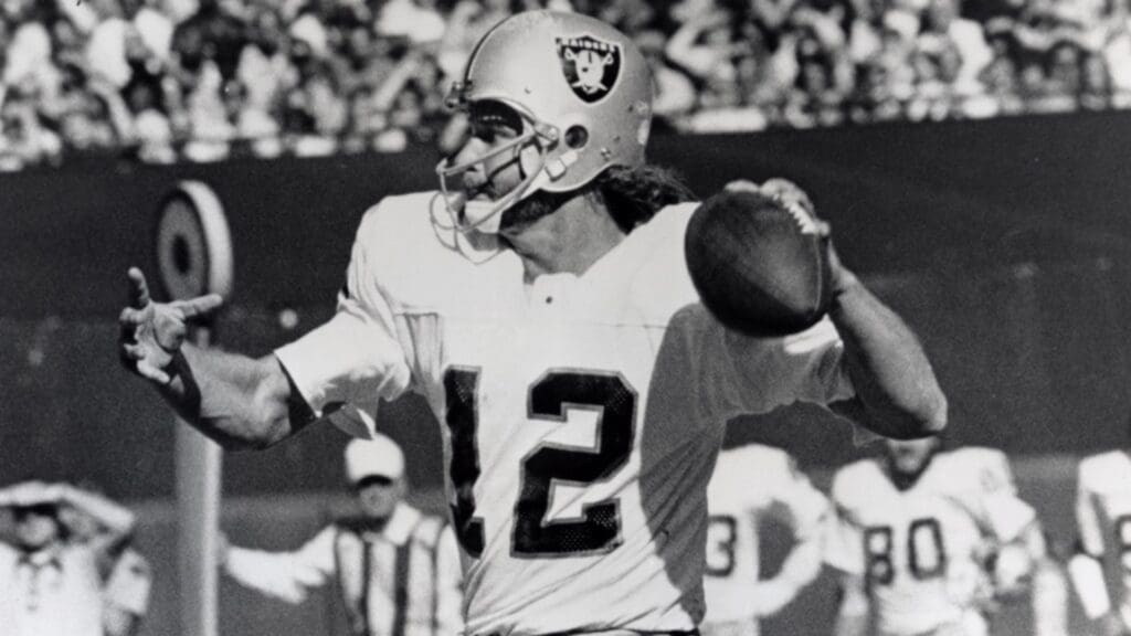 Sep 28, 1975; Baltimore, MD, USA; FILE PHOTO; Oakland Raiders quarterback Ken Stabler (12) scrambles against the Baltimore Colts at Memorial Stadium.
