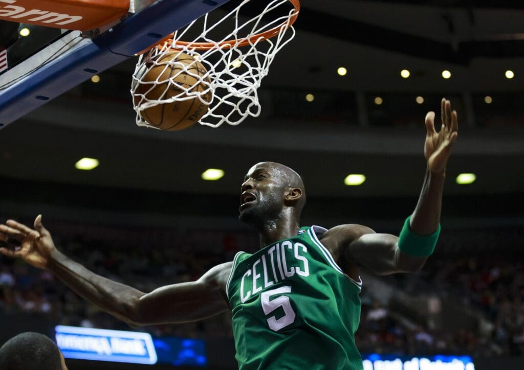 January 20, 2013; Auburn Hills, MI, USA; Boston Celtics power forward Kevin Garnett (5) dunks the ball against the Detroit Pistons in the second quarter at The Palace.