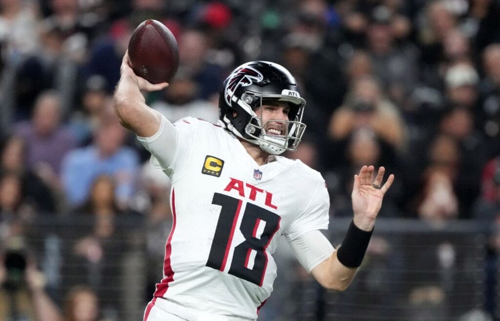 Dec 16, 2024; Paradise, Nevada, USA; Atlanta Falcons quarterback Kirk Cousins (18) throws the ball against the Las Vegas Raiders in the first half at Allegiant Stadium.