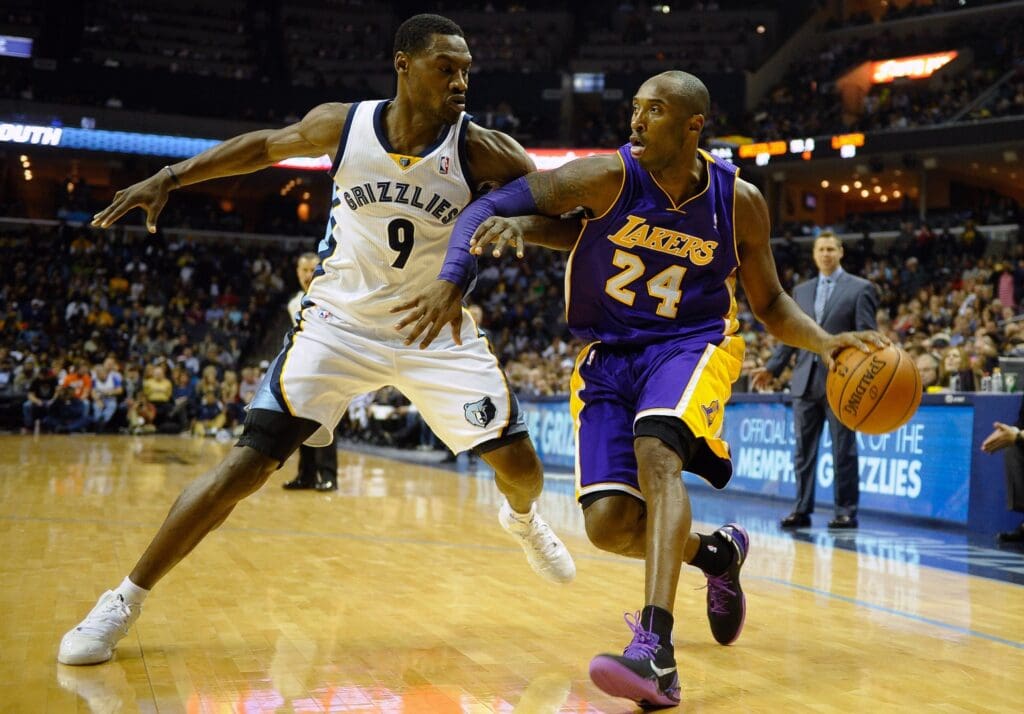 Dec 17, 2013; Memphis, TN, USA; Memphis Grizzlies shooting guard Tony Allen (9) guards Los Angeles Lakers shooting guard Kobe Bryant (24) during the fourth quarter at FedExForum. Los Angeles Lakers defeat the Memphis Grizzlies 96-92