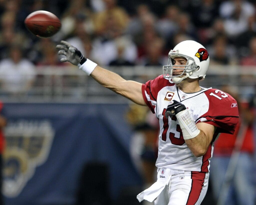 Nov 22, 2009; St. Louis, MO, USA; Arizona Cardinals quarterback Kurt Warner (13) attempts a pass against the St. Louis Rams during the first half at the Edward Jones Dome. 