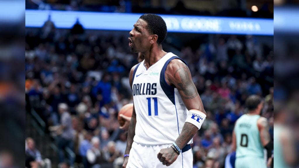 Feb 27, 2025; Dallas, Texas, USA; Dallas Mavericks guard Kyrie Irving (11) reacts after scoring against the Charlotte Hornets during the second half at American Airlines Center.
