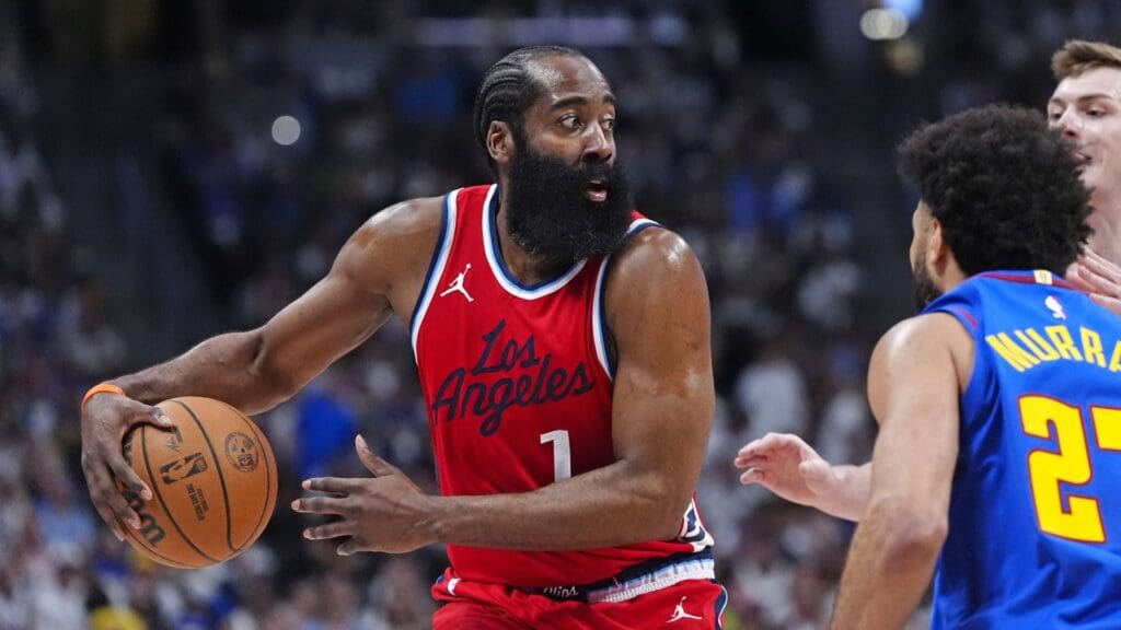 May 3, 2025; Denver, Colorado, USA; LA Clippers guard James Harden (1) prepares to pass the ball in the second quarter against the Denver Nuggets during game seven of first round for the 2025 NBA Playoffs at Ball Arena.