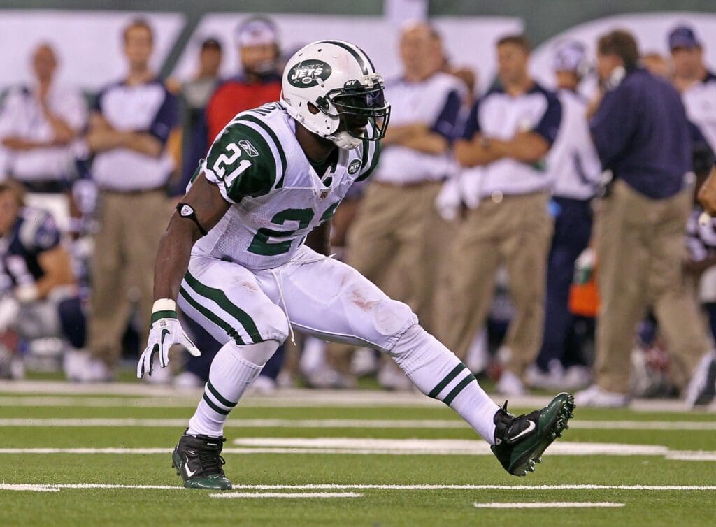 Sept 19, 2011; East Rutherford, NJ, USA; New York Jets running back LaDainian Tomlinson (21) celebrates his first down run on a fourth down play during the 2nd half against the New England Patriots at the New Meadowlands Stadium. The Jets defeated the Patriots 28-14. Mandatory Credit: Ed Mulholland-USA TODAY Sports