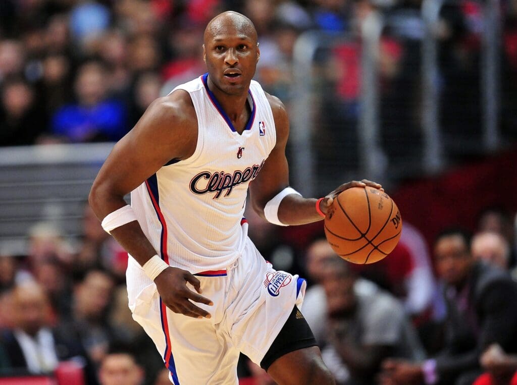 February 13, 2013; Los Angeles, CA, USA; Los Angeles Clippers power forward Lamar Odom (7) moves the ball down court against the Houston Rockets during the second half at Staples Center.