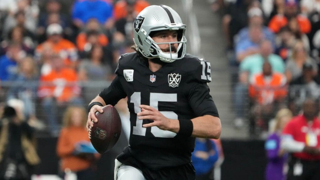 Nov 24, 2024; Paradise, Nevada, USA; Las Vegas Raiders quarterback Gardner Minshew (15) throws the ball against the Denver Broncos in the first half at Allegiant Stadium.
