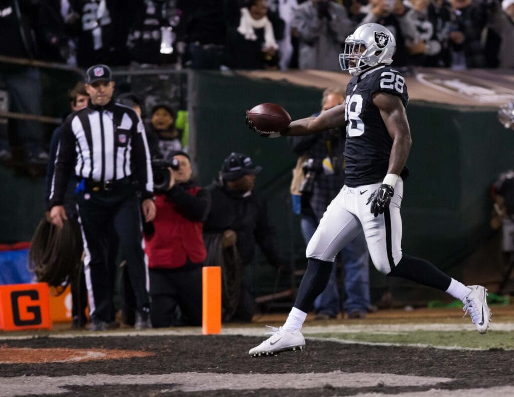 Dec 24, 2015; Oakland, CA, USA; Oakland Raiders running back Latavius Murray (28) scores a touchdown against the San Diego Chargers during the first quarter at O.co Coliseum.