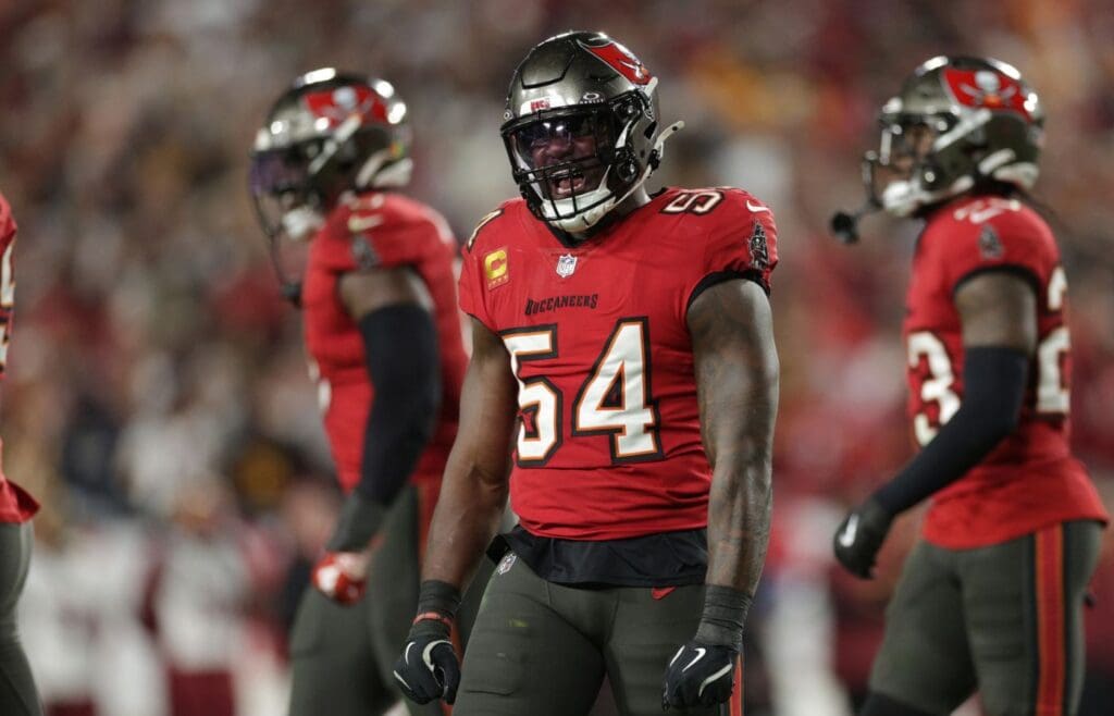 Jan 12, 2025; Tampa, Florida, USA; Tampa Bay Buccaneers linebacker Lavonte David (54) celebrates after a stop during the fourth quarter of a NFC wild card playoff against the Washington Commanders at Raymond James Stadium.