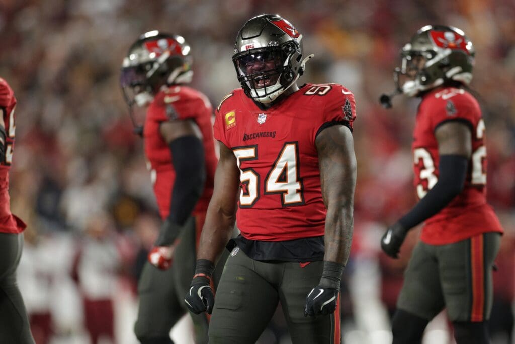 Jan 12, 2025; Tampa, Florida, USA; Tampa Bay Buccaneers linebacker Lavonte David (54) celebrates after a stop during the fourth quarter of a NFC wild card playoff against the Washington Commanders at Raymond James Stadium. Mandatory Credit: Nathan Ray Seebeck-Imagn Images