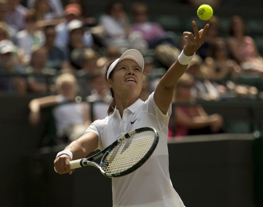 Jun 27, 2014;2014; London, United Kingdom; Na Li (CHN) in action during her match against Barbora Zahlavova Strycova (CZE) on day five of the 2014 Wimbledon Championships at the All England Lawn and Tennis Club. Mandatory Credit: Susan Mullane-USA TODAY Sports