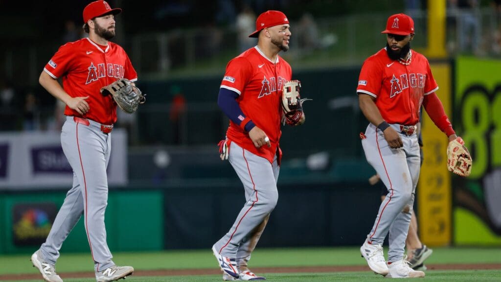 May 20, 2025; West Sacramento, California, USA; Los Angeles Angels third baseman Yoán Moncada (5) smiles as he walks off the field after the game against the Athletics at Sutter Health Park.