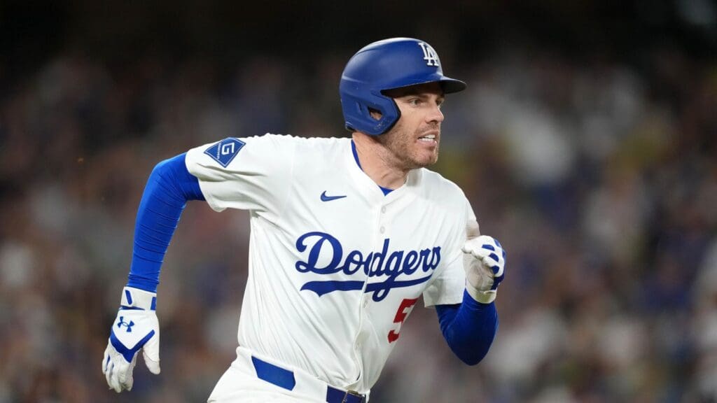 May 20, 2025; Los Angeles, California, USA; Los Angeles Dodgers first baseman Freddie Freeman (5) runs the bases after hitting a a double in the sixth inning against the Arizona Diamondbacks at Dodger Stadium.