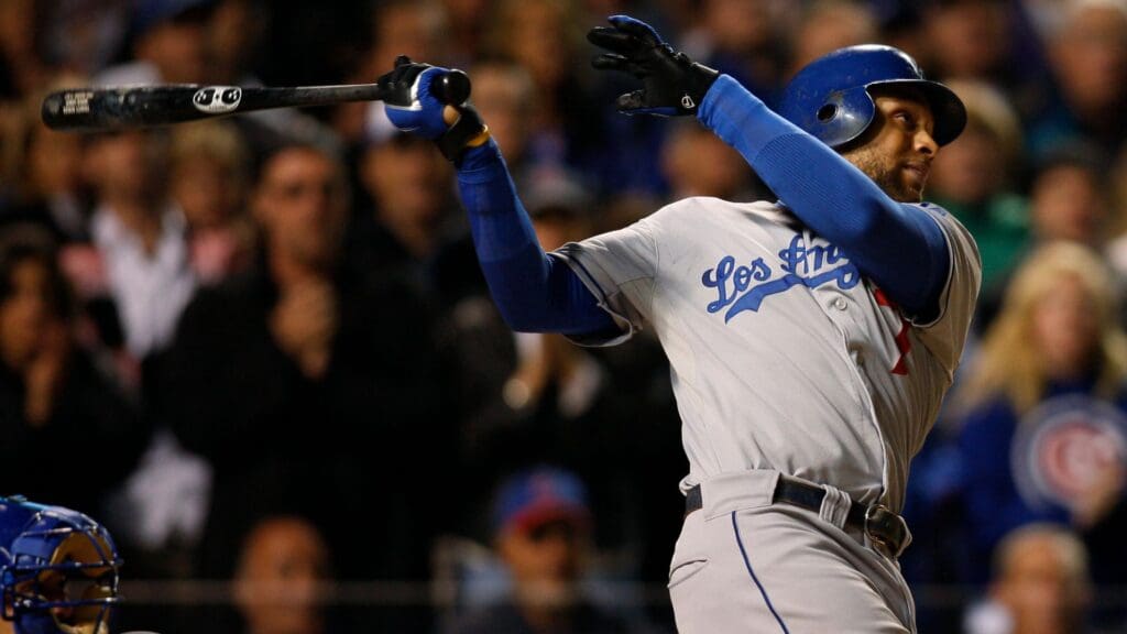 Oct 1, 2008; Chicago, IL, USA; Los Angeles Dodgers first baseman James Loney (7) hits a grand slam during the fifth inning in game one of the NLDS against the Chicago Cubs at Wrigley Field.