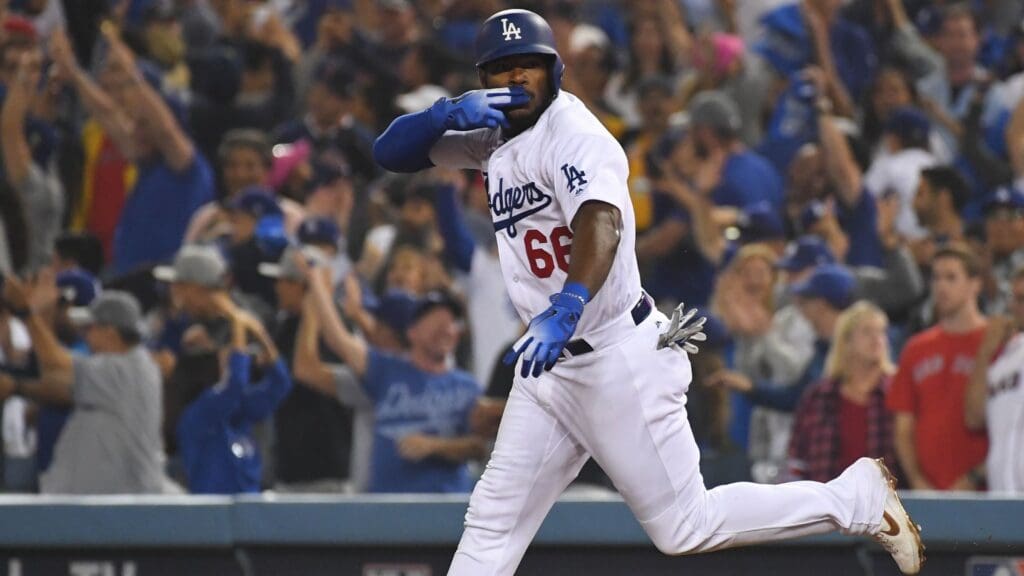 Oct 27, 2018; Los Angeles, CA, USA; Los Angeles Dodgers outfielder Yasiel Puig (66) celebrates hitting a three-run home run against the Boston Red Sox in the sixth inning in game four of the 2018 World Series at Dodger Stadium