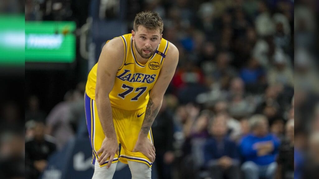 Apr 25, 2025; Minneapolis, Minnesota, USA; Los Angeles Lakers guard Luka Doncic (77) looks on against the Minnesota Timberwolves in the first half during game three of first round for the 2024 NBA Playoffs at Target Center.