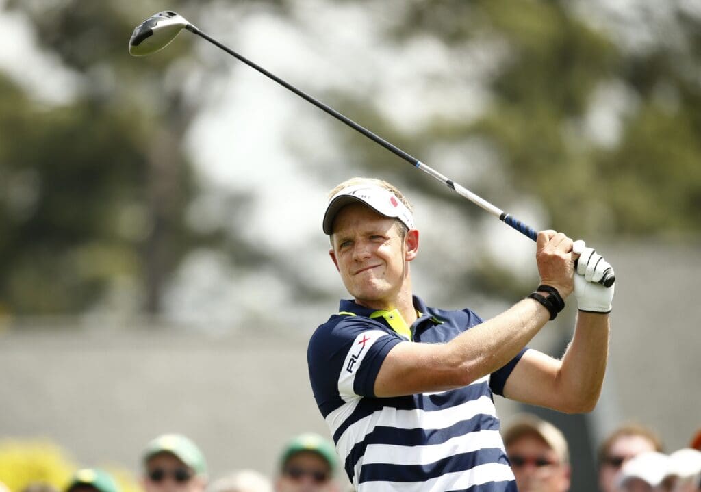 Apr 9, 2015; Augusta, GA, USA; Luke Donald hits his tee shot on the 1st hole during the first round of The Masters golf tournament at Augusta National Golf