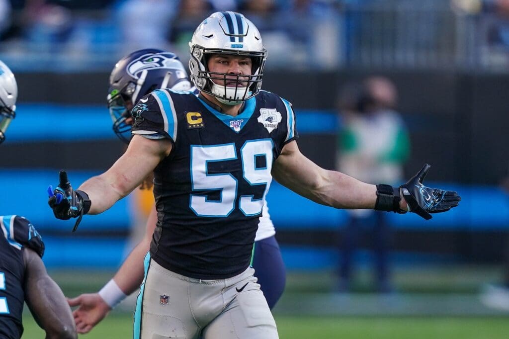 Dec 15, 2019; Charlotte, NC, USA; Carolina Panthers middle linebacker Luke Kuechly (59) looks back to the ref after a play against the Seattle Seahawks during the second half at Bank of America Stadium. Mandatory Credit: Jim Dedmon-USA TODAY Sports