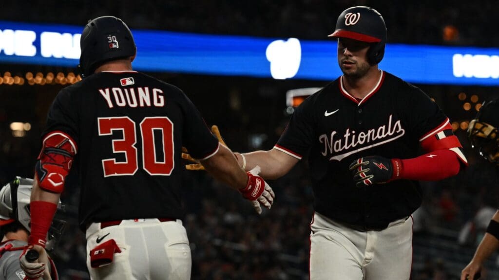 May 6, 2025; Washington, District of Columbia, USA; Washington Nationals catcher Riley Adams (15) celebrates hitting a solo home run with center fielder Jacob Young (30) during the sixth inning against the Cleveland Guardians at Nationals Park
