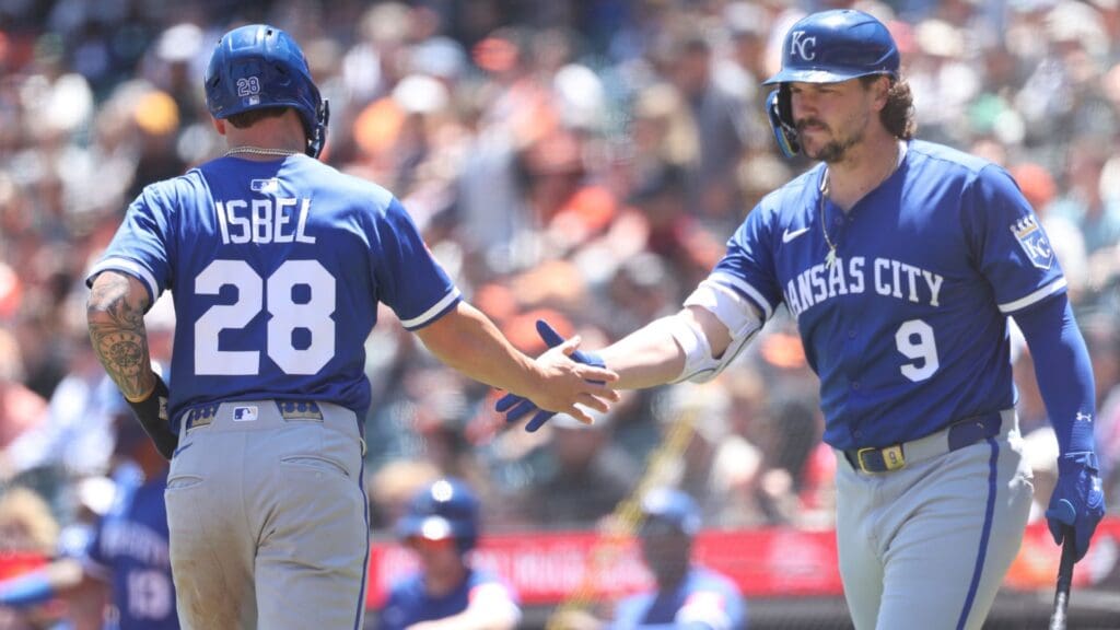 May 21, 2025; San Francisco, California, USA; Kansas City Royals center fielder Kyle Isbel (28) celebrates with designated hitter Vinnie Pasquantino (9) after scoring a run against the San Francisco Giants during the second inning at Oracle Park.
