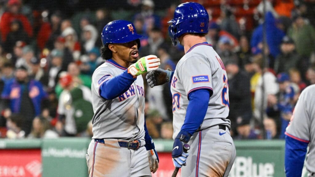 May 21, 2025; Boston, Massachusetts, USA; New York Mets shortstop Francisco Lindor (12) celebrates his home run against the Boston Red Sox with first baseman Pete Alonso (20) during the ninth inning at Fenway Park