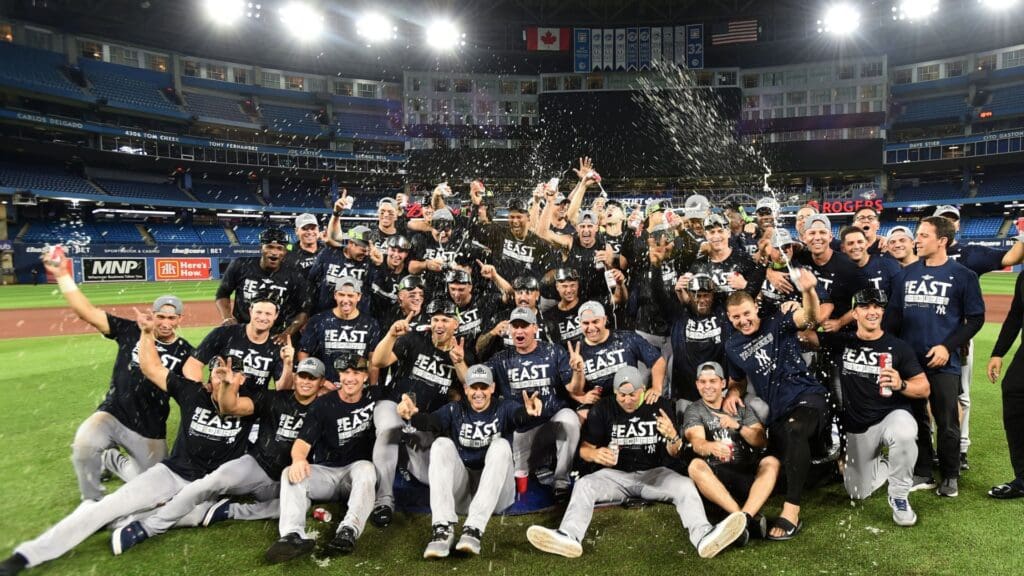 Sep 27, 2022; Toronto, Ontario, CAN; The New York Yankees pose for a team photo after defeating the Toronto Blue Jays to clinch the American League East division title at Rogers Centre
