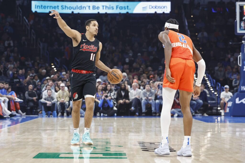 Jan 23, 2024; Oklahoma City, Oklahoma, USA; Portland Trail Blazers guard Malcolm Brogdon (11) gestures to his team on a play against the Oklahoma City Thunder during the first quarter at Paycom Center. Mandatory Credit: Alonzo Adams-USA TODAY Sports