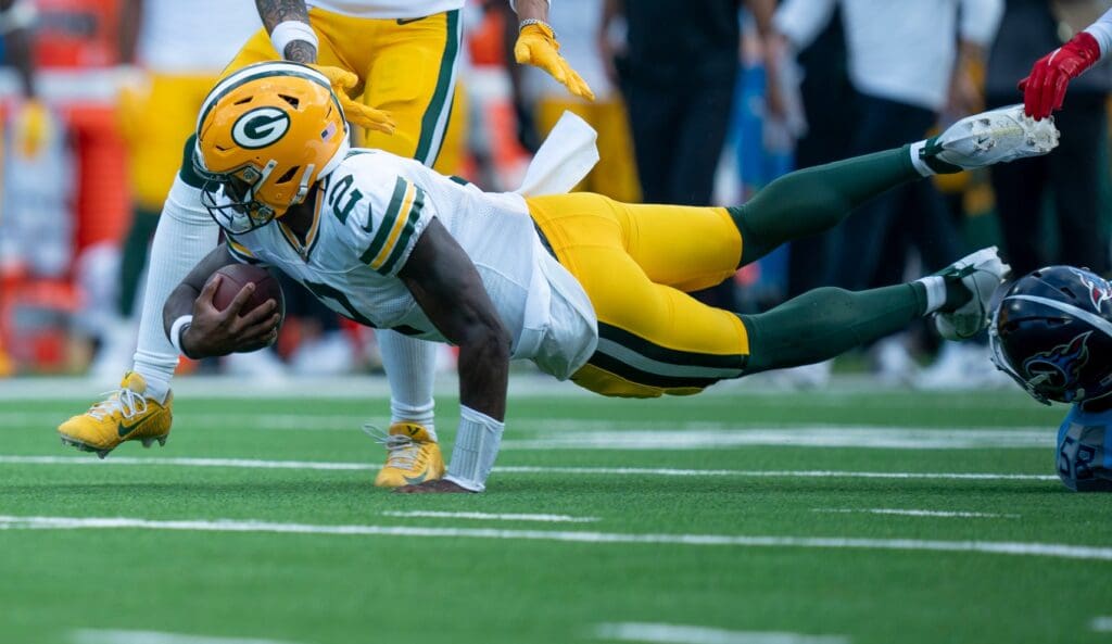 Green Bay Packers quarterback Malik Willis (2) dives for a first down against the Tennessee during their game at Nissan Stadium in Nashville, Tenn., Sunday, Sept. 22, 2024.