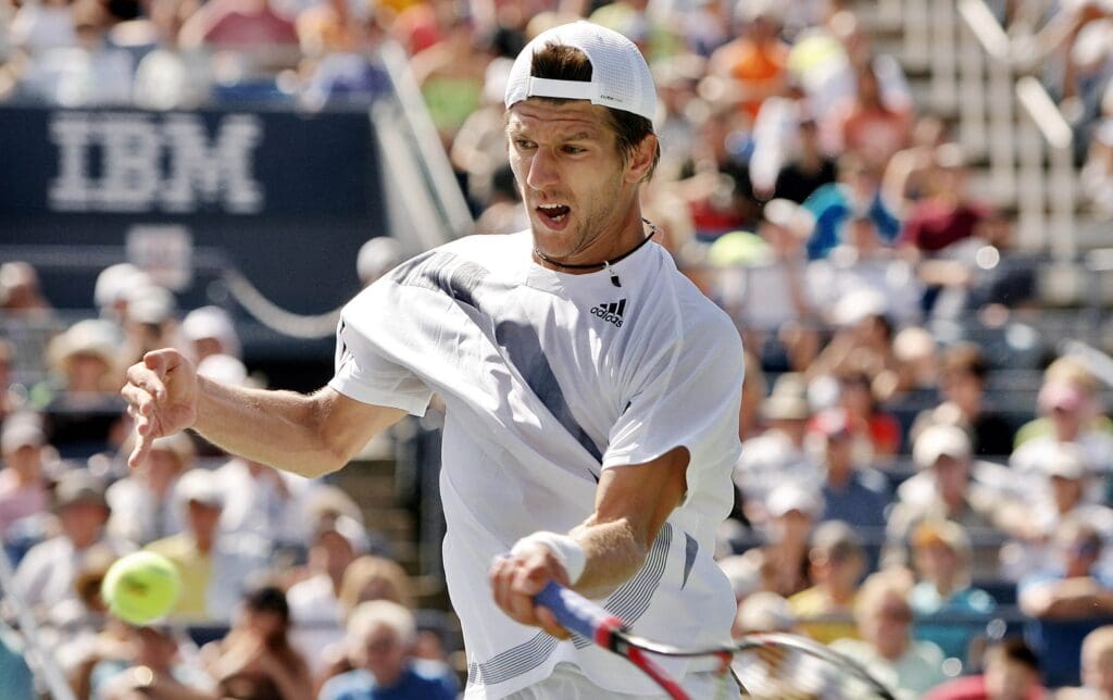 Sep 2, 2009; Flushing, NY, USA; Jurgen Melzer (AUT) returns a shot against Marat Safin (RUS) on day three of the 2009 US Open in Flushing Meadows. Melzer won 1-6, 6-4, 6-3, 6-4.