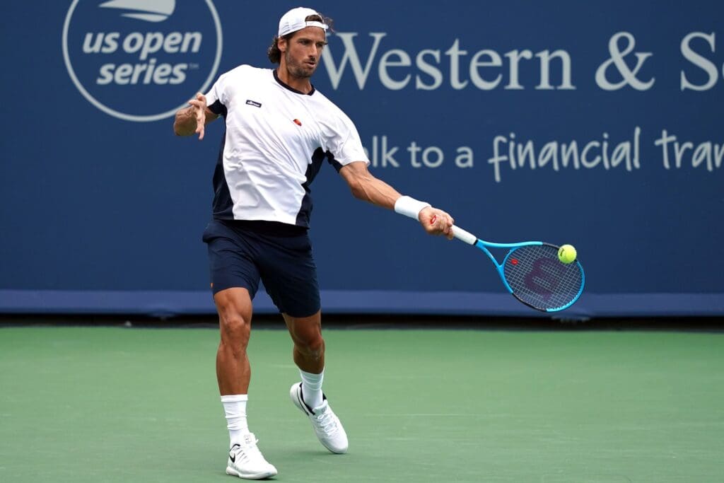 Aug 11, 2018; Mason, OH, USA; Feliciano Lopez (ESP) returns a shot against Marcos Baghdatis (CYP) in the Western and Southern tennis open at Lindner Family Tennis Center. Mandatory Credit: Aaron Doster-USA TODAY Sports