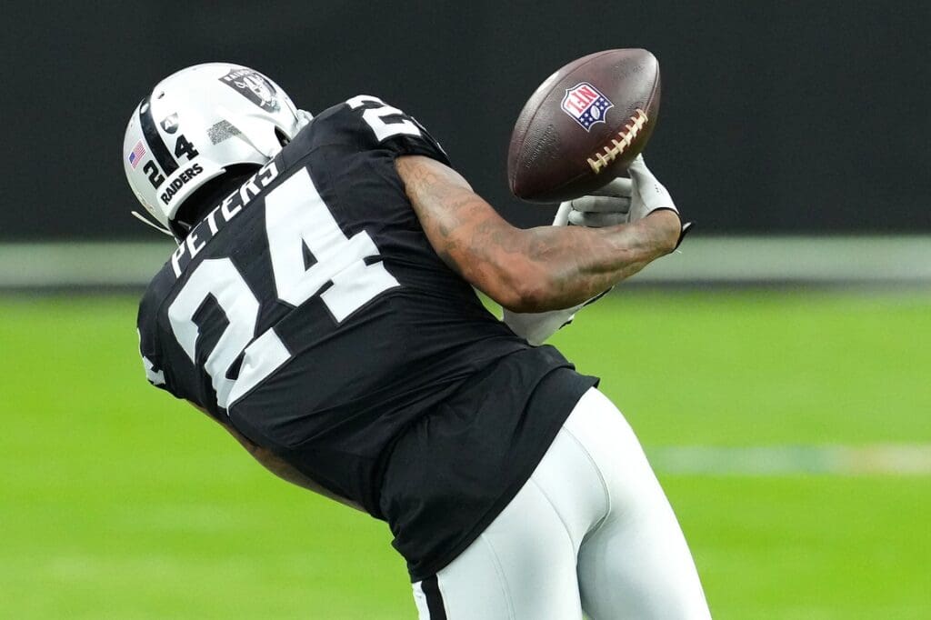 Nov 5, 2023; Paradise, Nevada, USA; Las Vegas Raiders cornerback Marcus Peters (24) nearly intercepts a New York Giants pass during the first quarter at Allegiant Stadium.