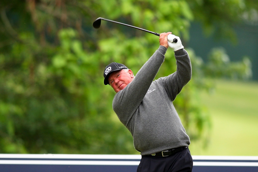 May 23, 2013; St. Louis, MO, USA; Mark O'Meara follows through on his tee shot on the 11th hole during first round of the 74th Senior PGA Championship at Bellerive Country Club.