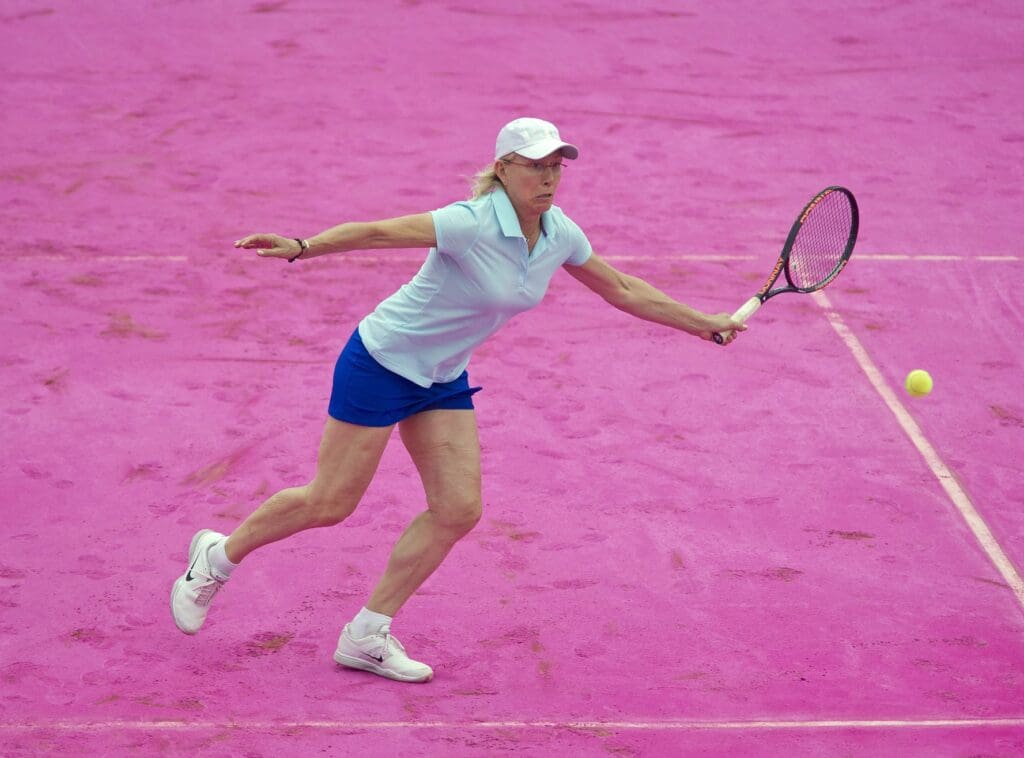 June 7, 2012; Paris, FRANCE; Former tennis player Martina Navratilova plays on the newly resurfaced pink court at Roland Garros. Women had the honor of playing on this one-day-only surface.