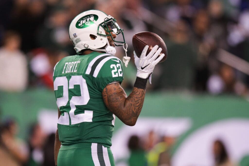 Nov 2, 2017; East Rutherford, NJ, USA; New York Jets running back Matt Forte (22) celebrates his touchdown against the Buffalo Bills during the second half at MetLife Stadium.