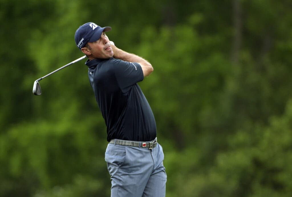 Apr 10, 2015; Augusta, GA, USA; Matt Kuchar hits his tee shot on the 12th hole during the second round of The Masters golf tournament at Augusta National Golf Club.