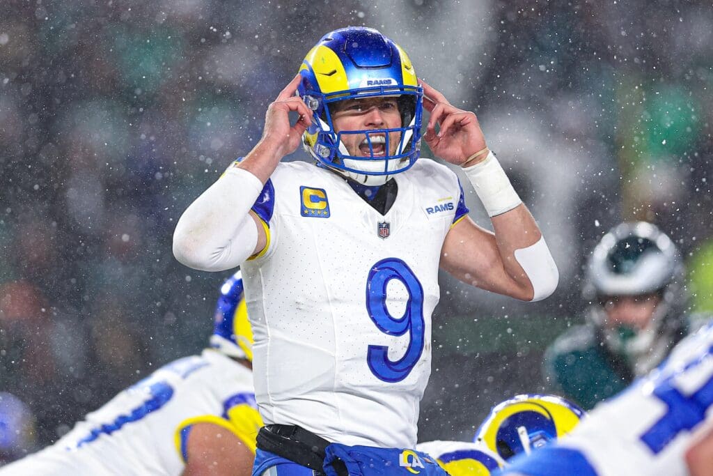 Jan 19, 2025; Philadelphia, Pennsylvania, USA; Los Angeles Rams quarterback Matthew Stafford (9) calls a play at the one of scrimmage against the Philadelphia Eagles in a 2025 NFC divisional round game at Lincoln Financial Field.