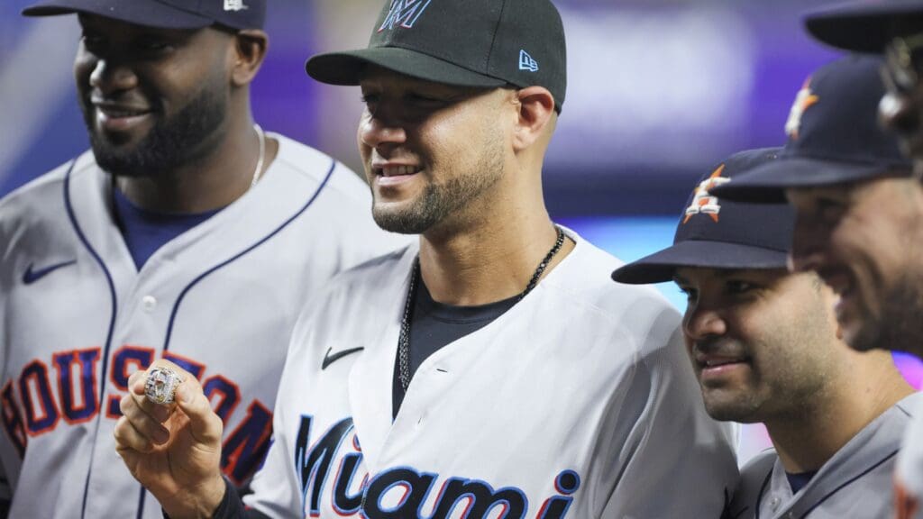 Aug 15, 2023; Miami, Florida, USA; Miami Marlins first baseman Yuli Gurriel (10) is presented with a 2022 World Series championship ring by Houston Astros designated hitter Yordan Alvarez (44), second baseman Jose Altuve (27) and third baseman Alex Bregman (2) prior to a game at loanDepot Park.