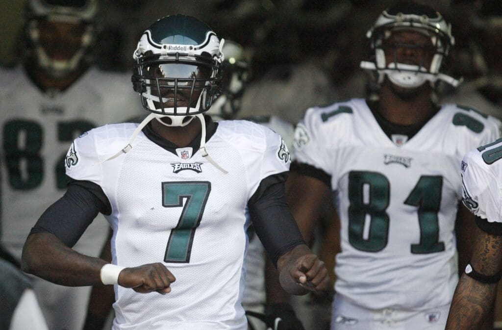 August 18, 2011; Pittsburgh,PA, USA: Philadelphia Eagles quarterback Michael Vick (7) leads the team onto the field for warm-ups before playing the Pittsburgh Steelers at Heinz Field. Mandatory Credit: Charles LeClaire-USPRESSWIRE