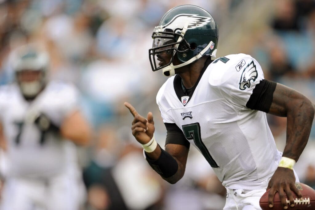 September 26, 2010; Jacksonville, FL, USA; Philadelphia Eagles quarterback Michael Vick (7) scrambles out of the pocket against the Jacksonville Jaguars during the first quarter at the EverBank Field.