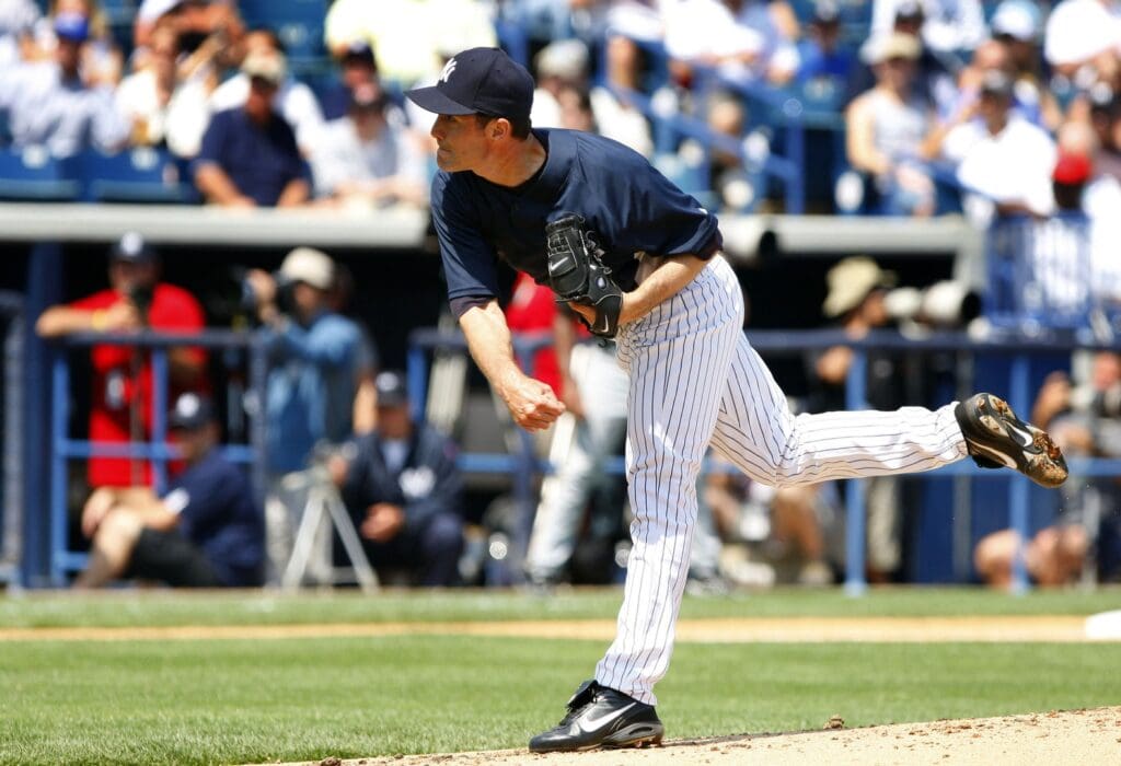 Mar 13, 2008; Tampa, FL, USA; New York Yankees pitcher Mike Mussina (35) throws a pitch against the Pittsburgh pirates during their spring training game at Legends Field.