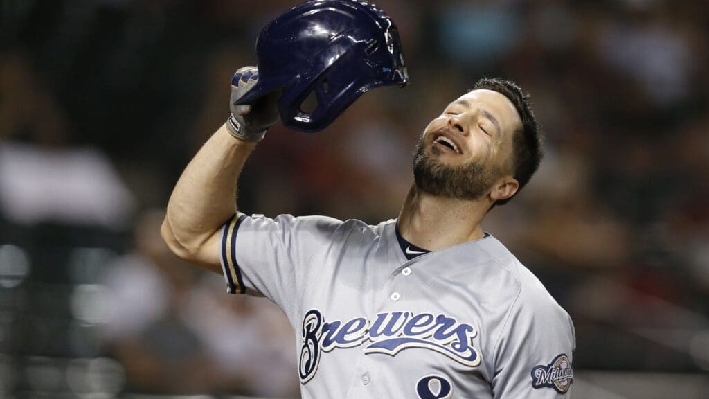 Jul 20, 2019; Phoenix, AZ, USA; Milwaukee Brewers left fielder Ryan Braun (8) reacts after fouling a pitch off his foot in the eighth inning during a baseball game againts the Arizona Diamondbacks at Chase Field.