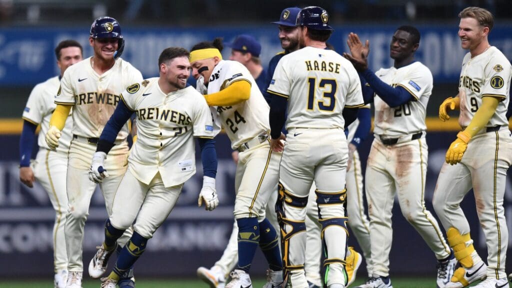 May 28, 2025; Milwaukee, Wisconsin, USA; Milwaukee Brewers third baseman Caleb Durbin (21) celebrates with teammates after the victory over the Boston Red Sox at American Family Field