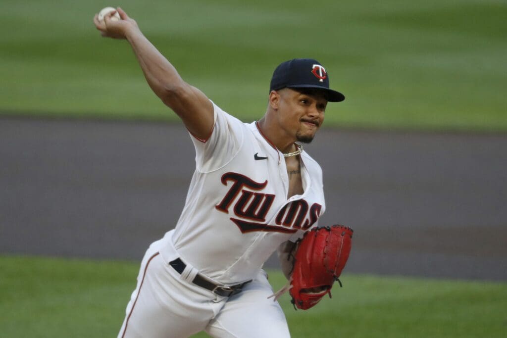 Minnesota Twins starting pitcher Chris Archer (17) throws to the Cleveland Guardians in the first inning at Target Field.