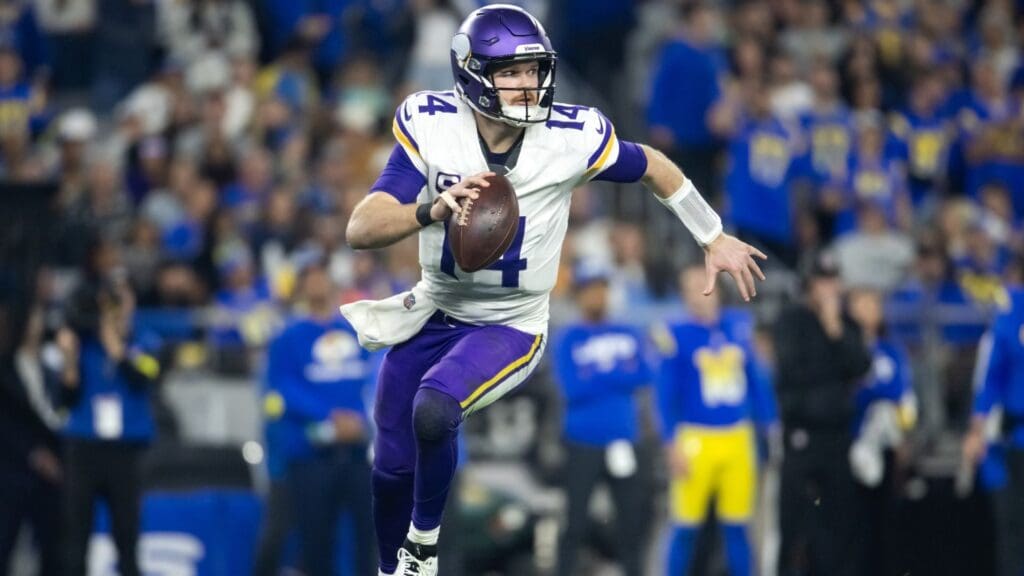 Jan 13, 2025; Glendale, AZ, USA; Minnesota Vikings quarterback Sam Darnold (14) against the Los Angeles Rams during an NFC wild card game at State Farm Stadium.