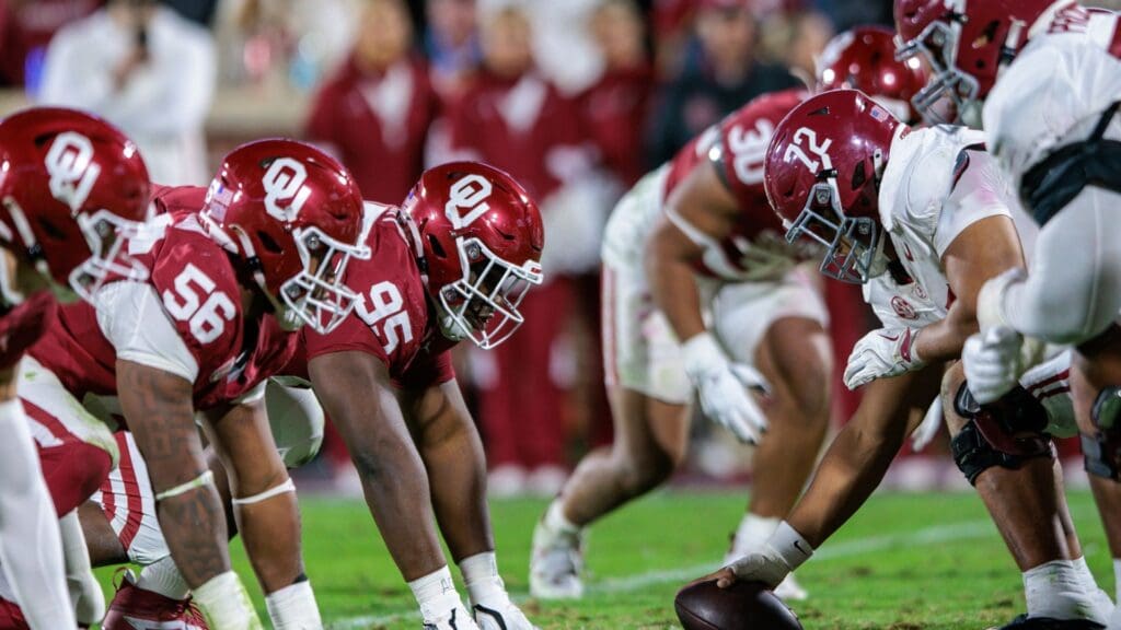 Nov 23, 2024; Norman, Oklahoma, USA; Oklahoma Sooners defensive line ready for the play against the Alabama Crimson Tide during the fourth quarter at Gaylord Family-Oklahoma Memorial Stadium