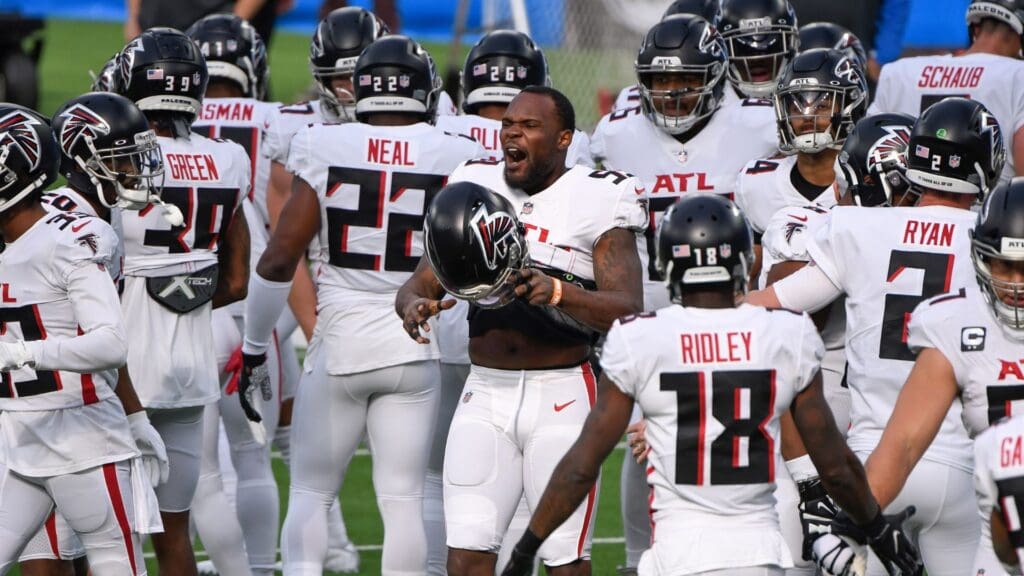 Dec 13, 2020; Inglewood, California, USA; Atlanta Falcons linebacker LaRoy Reynolds (59) puts on his helmet as he and the rest of the team take the field for pregame warmups before playing the Los Angeles Chargers at SoFi Stadium