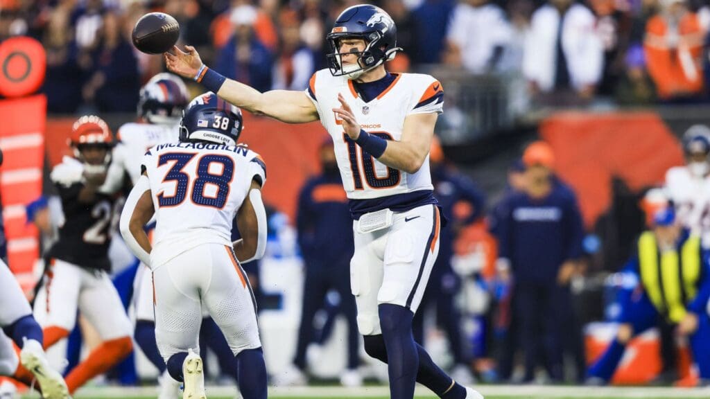 Dec 28, 2024; Cincinnati, Ohio, USA; Denver Broncos quarterback Bo Nix (10) throws a pass against the Cincinnati Bengals in the first half at Paycor Stadium.