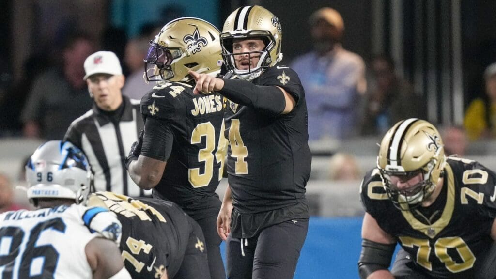 Sep 18, 2023; Charlotte, North Carolina, USA; New Orleans Saints quarterback Derek Carr (4) calls signals on the line against the Carolina Panthers during the second half at Bank of America Stadium