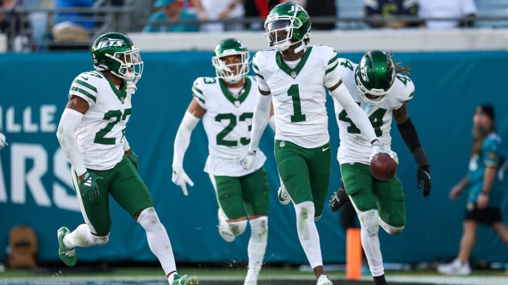 Dec 15, 2024; Jacksonville, Florida, USA; New York Jets cornerback Sauce Gardner (1) celebrates after an interception against the Jacksonville Jaguars in the fourth quarter at EverBank Stadium
